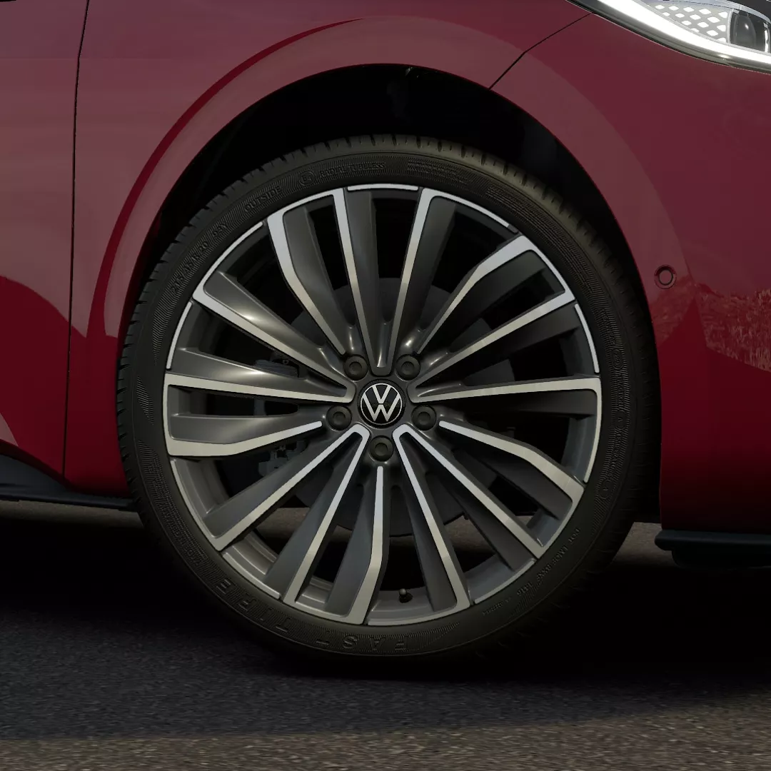 Llantas deportivas de aleación de Volkswagen ID.3 con diseño radial de seis radios y acabado negro y gris sobre carrocería de color rojo